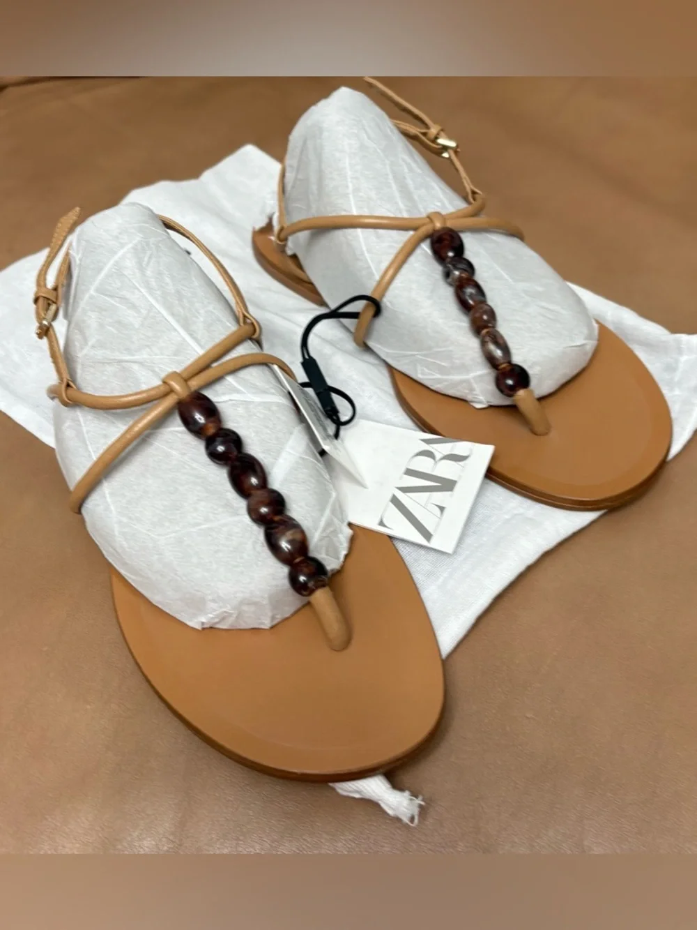 ZARA Tan Leather Beaded T-Strap Sandals
6.5 (37) NWT - Picture 7 of 7